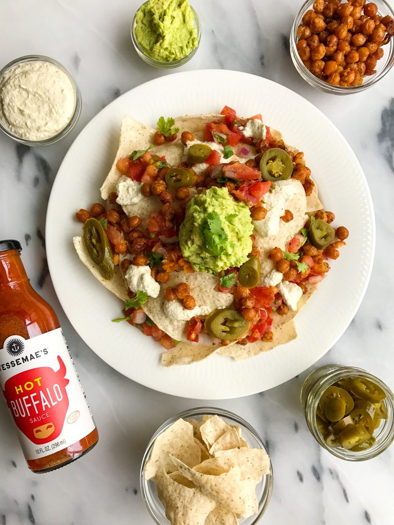 Vegan Buffalo Chickpea Nachos with Queso Sauce for a delicious plant-based nacho treat!