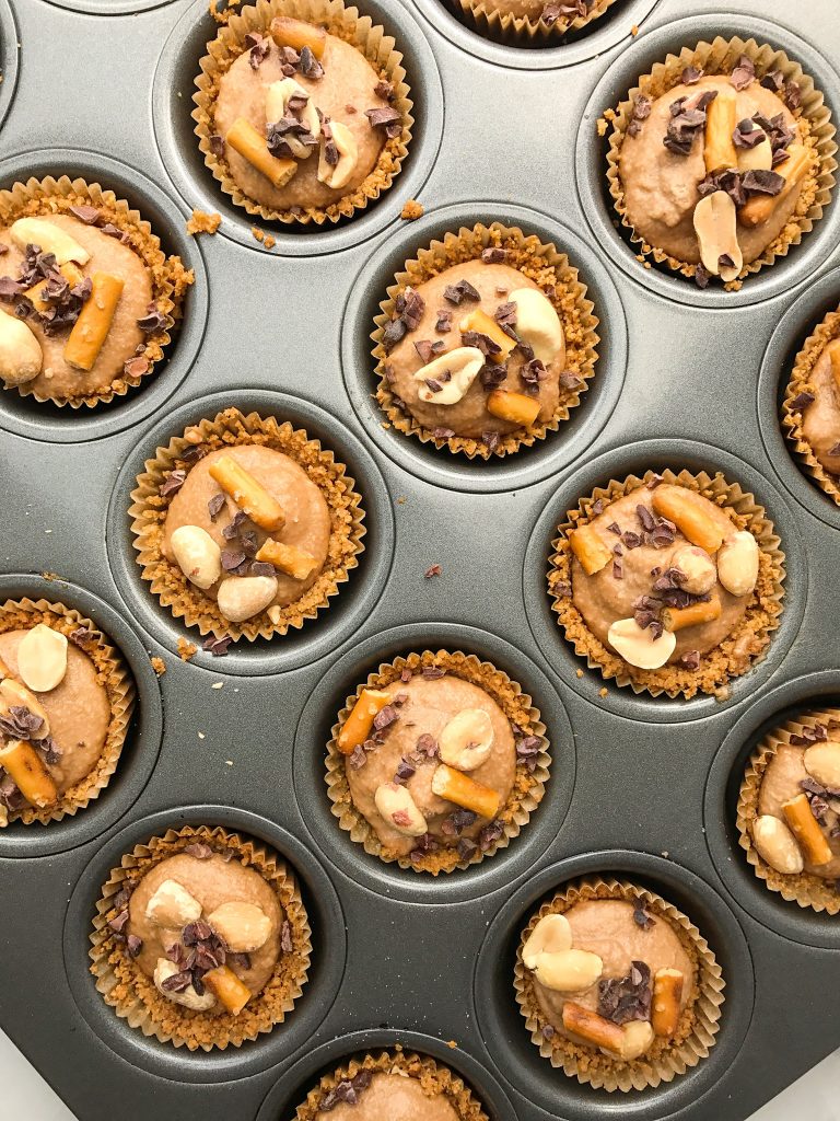 Chocolate Peanut Butter Pretzel Cheesecake Bites made with a gluten-free pretzel crust!