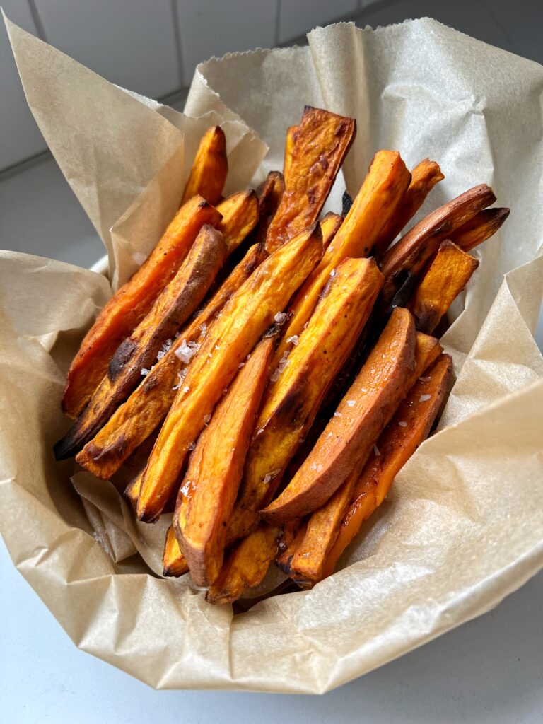 The best sweet potato fries recipe! With my tip on how to get them extra crispy.