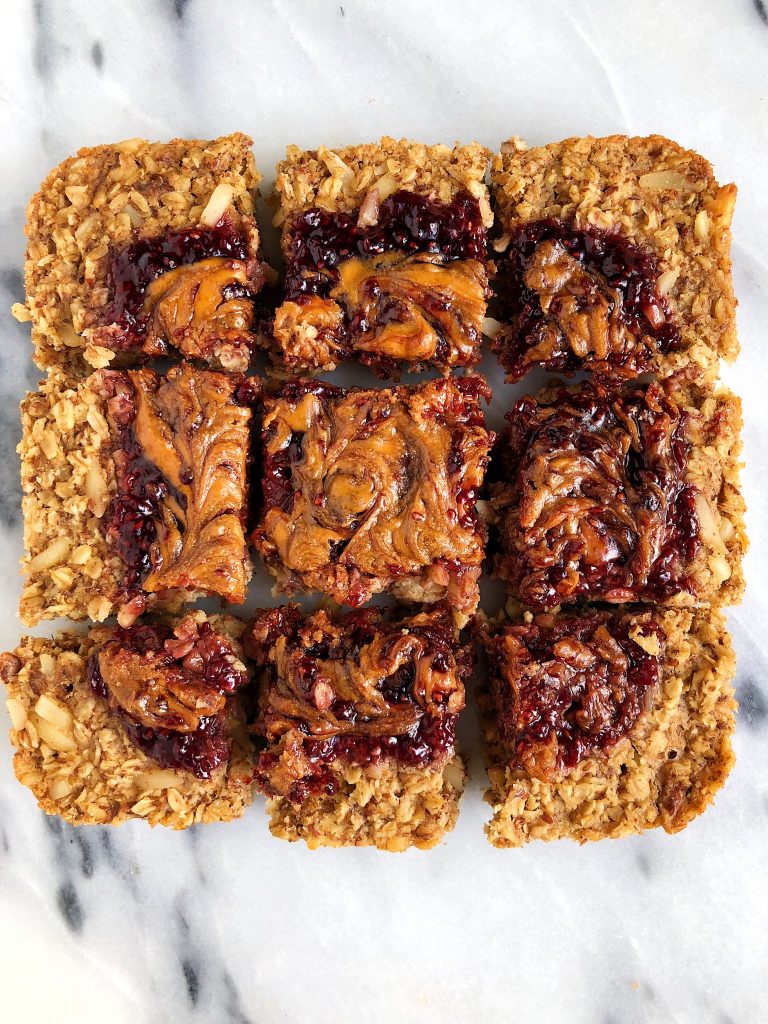 Sharing this delicious and simple Baked PB&J Oatmeal made with vegan, gluten-free and healthy ingredients like sprouted rolled oats, almonds and creamy peanut butter!