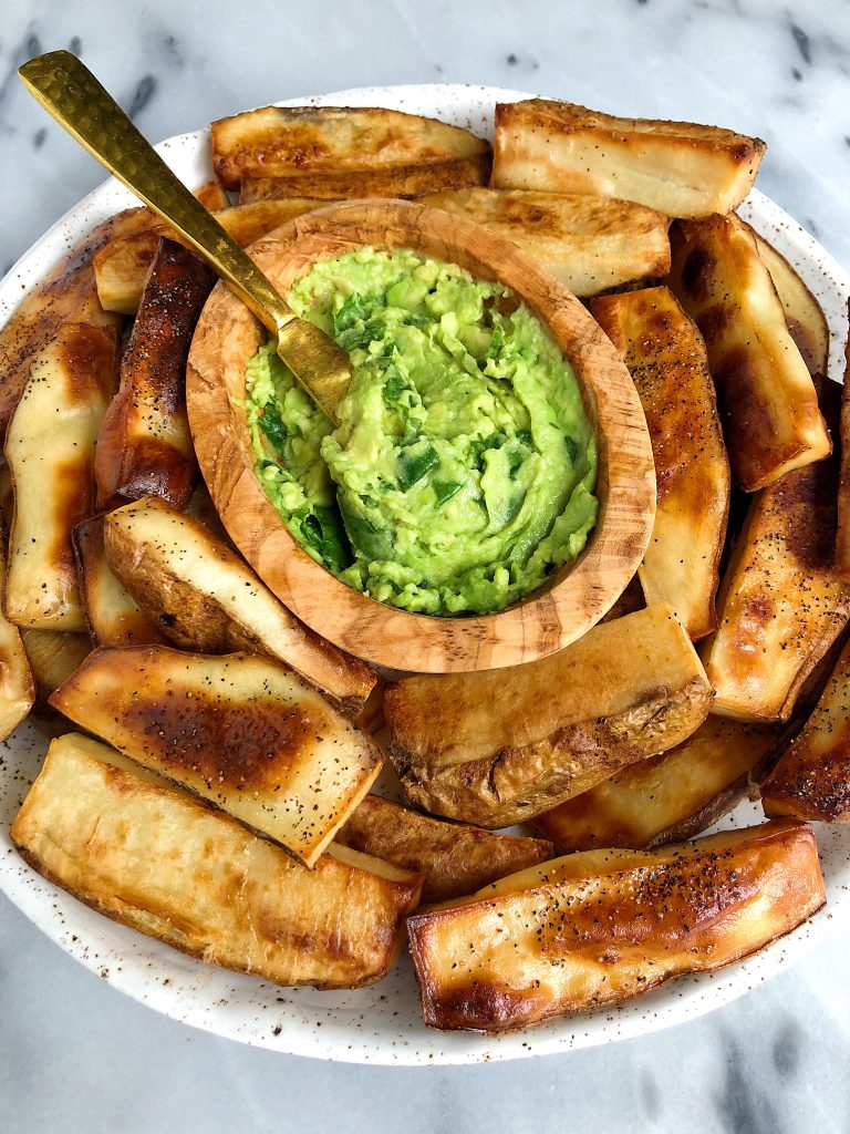 Crispy Baked Thick-Cut Fries made in the oven and paired with a delicious and healthy Supergreen Guacamole for an plant-based and gluten-free recipe!