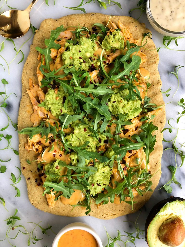 Paleo Guacamole Buffalo Chicken Pizza made with free-range organic chicken and a paleo pizza crust for a delicious gluten and dairy-free pizza recipe!