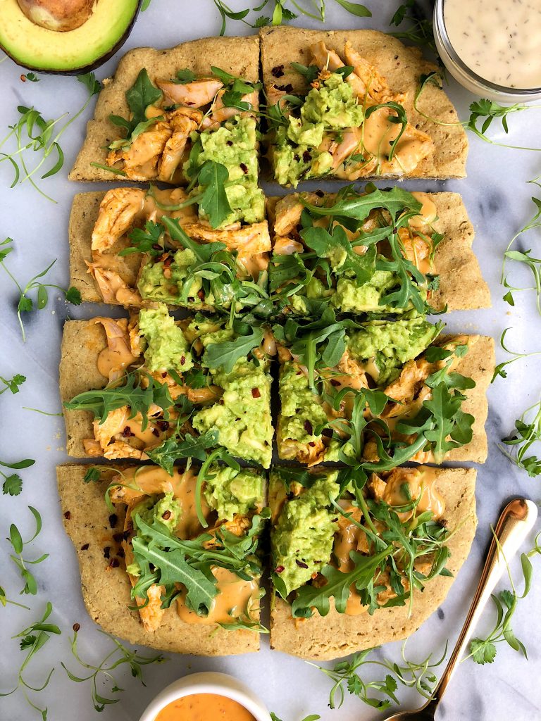 Paleo Guacamole Buffalo Chicken Pizza made with free-range organic chicken and a paleo pizza crust for a delicious gluten and dairy-free pizza recipe!