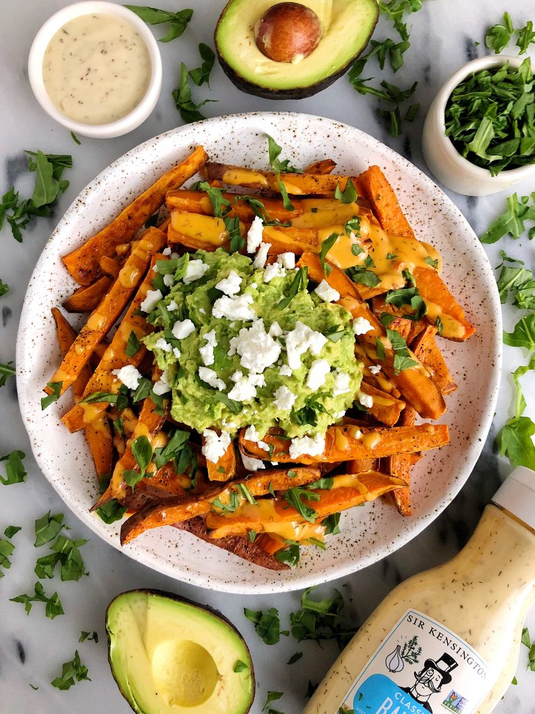 Loaded Guacamole Baked Sweet Potato Fries for a delicious and flavorful french fry recipe that is gluten-free and dairy-free!