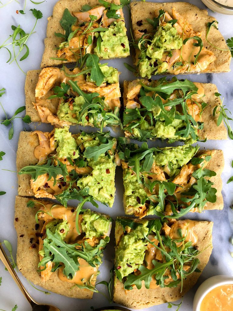 Paleo Guacamole Buffalo Chicken Pizza made with free-range organic chicken and a paleo pizza crust for a delicious gluten and dairy-free pizza recipe!