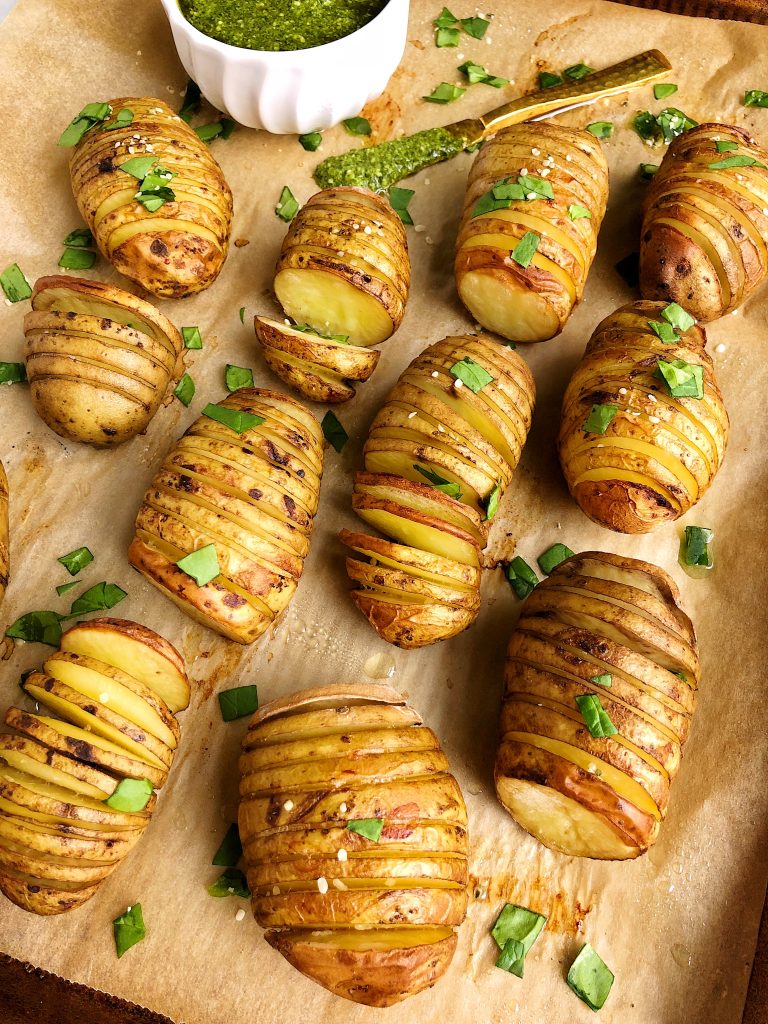 Sharing these Whole30 Hasselback Potatoes with Garlicky Basil Pesto. One of my favorite vegan and Whole30 approved recipes to make!