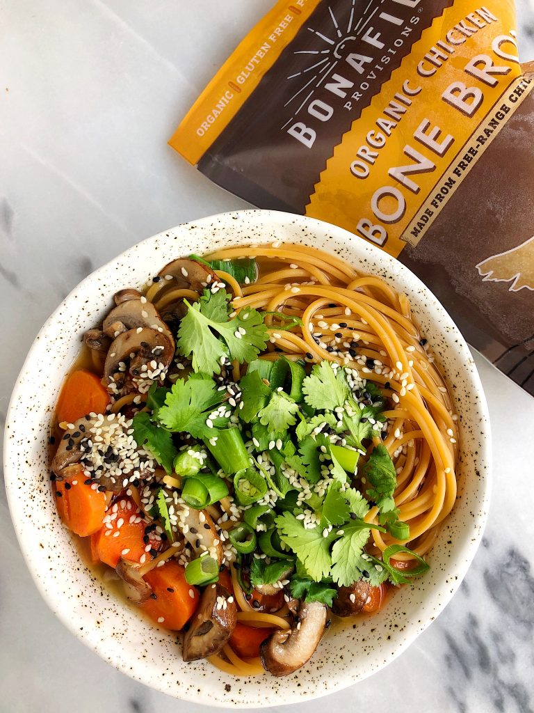 A warm and nourishing Ginger Bone Broth Noodle Bowl made for two with all gluten-free, dairy-free and wholesome ingredients for an easy and healthy soup!
