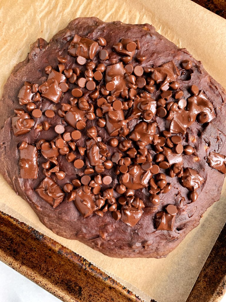 One Giant Fudgy Chocolate Chip Brownie Cookie made with all gluten-free, dairy-free ingredients for a low sugar easy dessert!