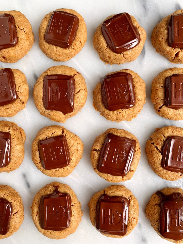 The Best Healthy Peanut Butter Blossoms made with vegan and gluten-free ingredients and topped with nut butter-filled dark chocolate!