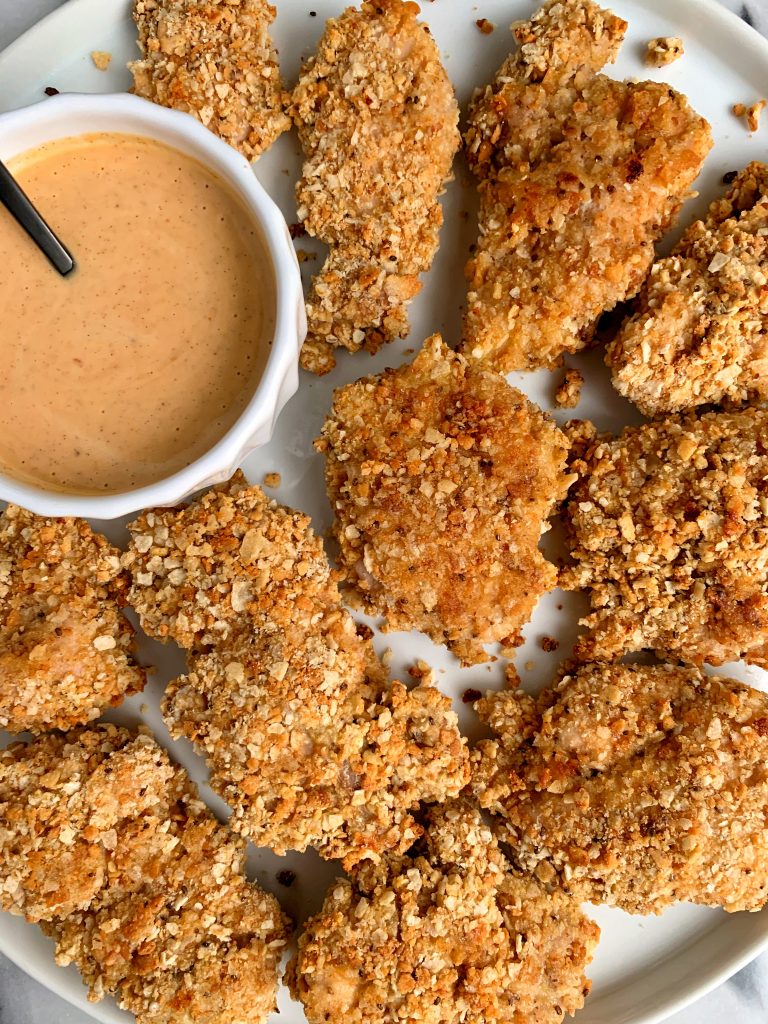 Healthier Paleo Crispy Chicken Tenders made with 3 key ingredients and paired with a homemade special sauce to dip!