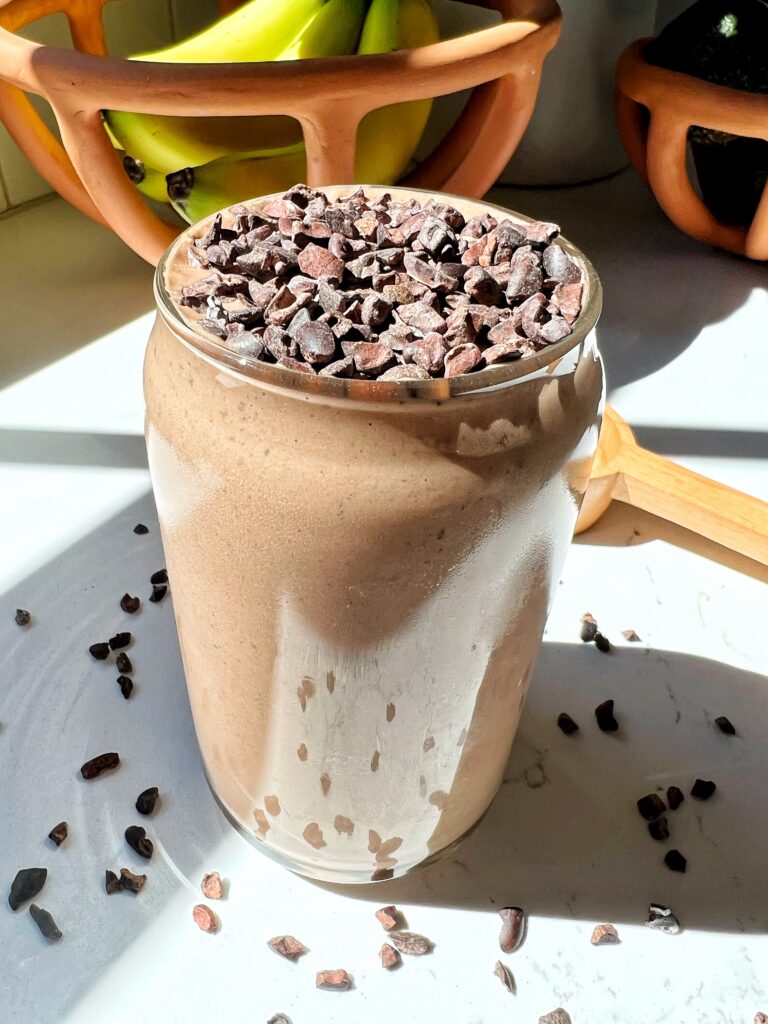 The Ultimate Chocolate Peanut Butter Smoothie to make. A delicious vegan smoothie recipe filled with protein and with an added crunch from cacao nibs!