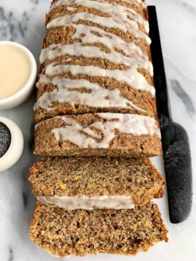 The Best Paleo Lemon Poppyseed Bread made with all gluten-free and dairy-free ingredients. Sweetened with maple syrup and glazed with a little coconut butter on top.