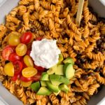 Healthy Vegetarian Enchilada Pasta made with 4 key ingredients for a quick and easy dinner for the family! Plus it is vegetarian, gluten-free, dairy free-friendly and ready in 10 minutes.