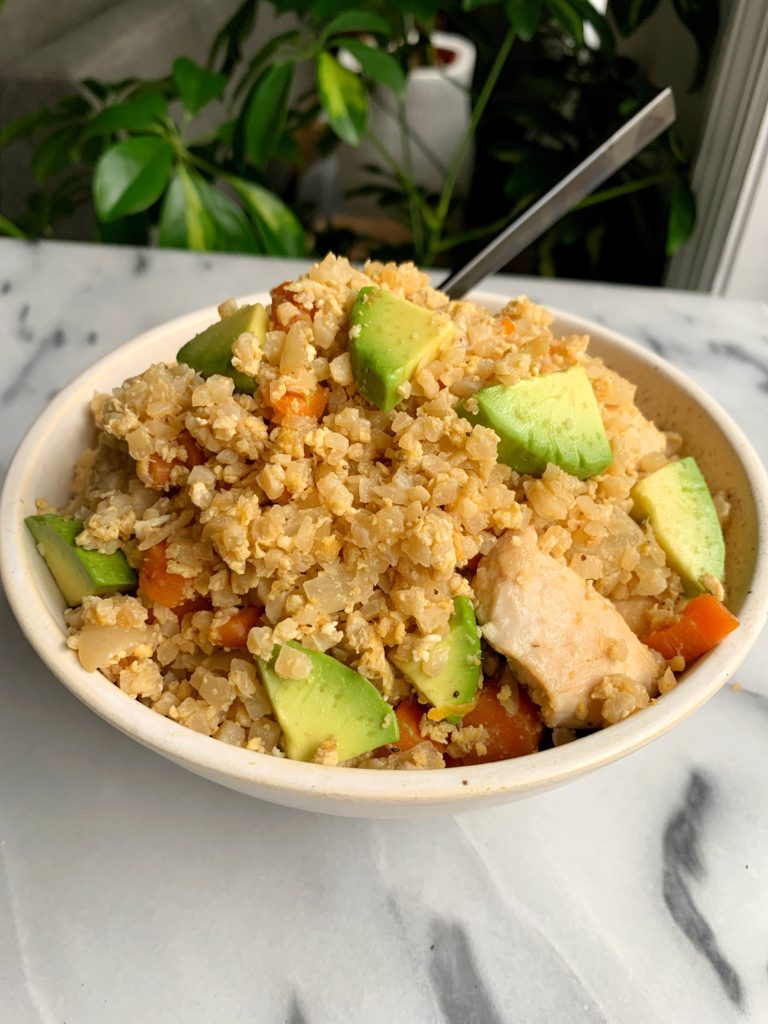 This 10-minute Cauliflower Fried Rice is the easiest dinner recipe to whip up using whatever is in your freezer. It is also paleo, gluten-free and dairy-free.