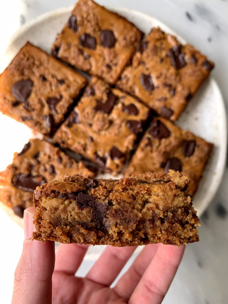 Gluten-free Chocolate Chip Cookie Cheesecake Bars made with all gluten-free ingredients, no refined sugar and they have the best cookie dough bottom layer, cheesecake center and on top crumbled cookie dough!