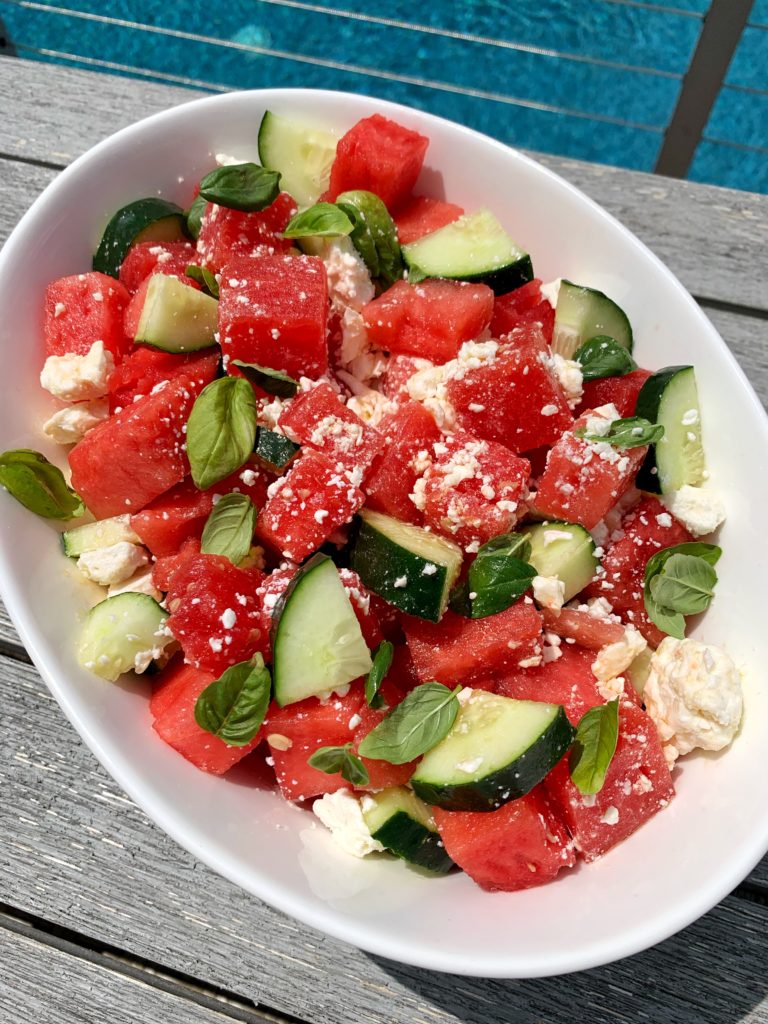 Sharing the most summery summertime salad: this Watermelon Salad with Feta, Cucumber + Basil. Take 5 minutes to prep and is incredibly refreshing, delicious and a healthy salad to serve all summer long.