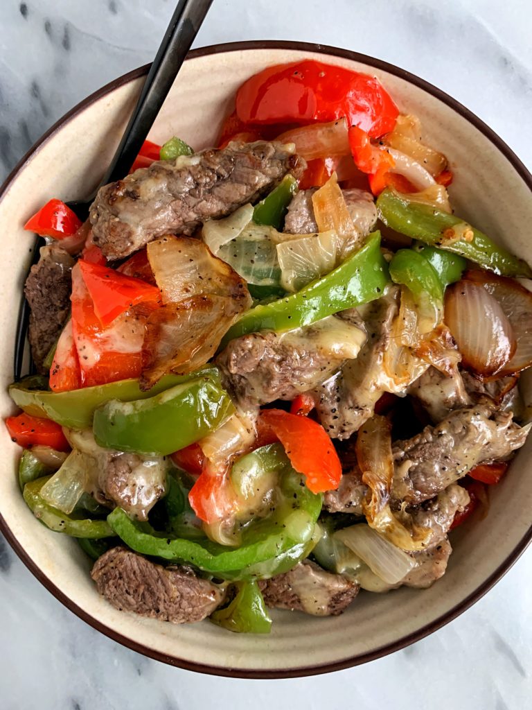 The most INSANE Philly Cheesesteak Skillet ready in 15 minutes in one skillet. This recipe is a healthier version of one of my personal favorite foods and you can enjoy it on top of a salad or on your favorite toasted bread.