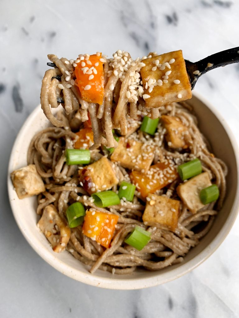 Sharing my latest vegan meal idea: Healthy Chili Peanut Noodles with Crispy Sesame Tofu today on the blog! An easy and delicious gluten-free dish that is so flavorful and tasty and filled with yummy crispy tofu.