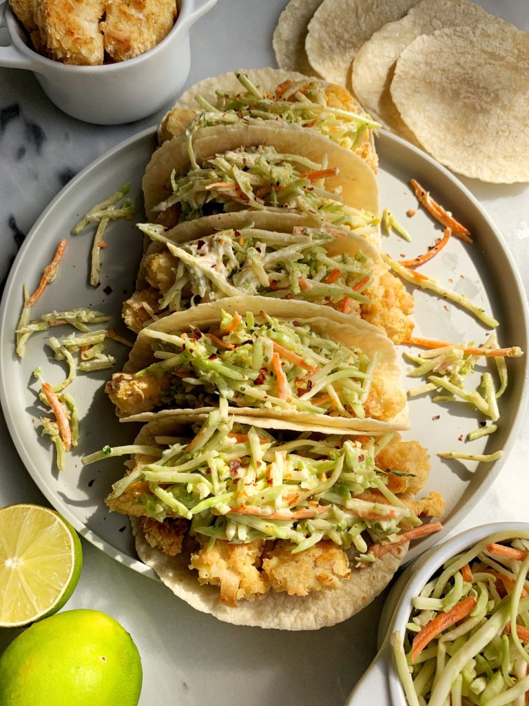 The Best Crispy Oven-Baked Paleo Fish Tacos made with all gluten-free ingredients and ready in less than 30 minutes start to finish. A family favorite over here that we all crave for dinner.