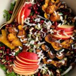 The Ultimate Healthy Harvest Salad made with all gluten-free and vegetarian ingredients. An absolutely delicious wholesome salad filled with roasted squash, fall fruits and a homemade pomegranate honey dressing.