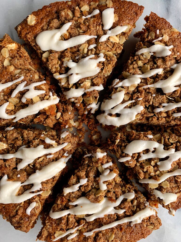 The Best Damn Vegan Carrot Coffee Cake made with all gluten-free ingredients. The most delicious sweet breakfast cake or snack to enjoy with a dreamy crumb cake topping on top of a healthier carrot cake recipe.