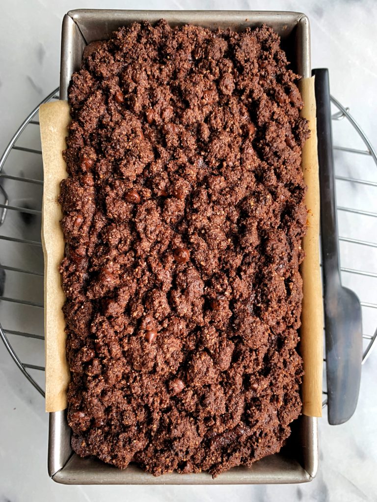 Paleo Brownie Banana Bread with a dreamy chocolate crumb topping! The most delicious and healthy gluten-free and refined sugar-free double brownie banana bread.