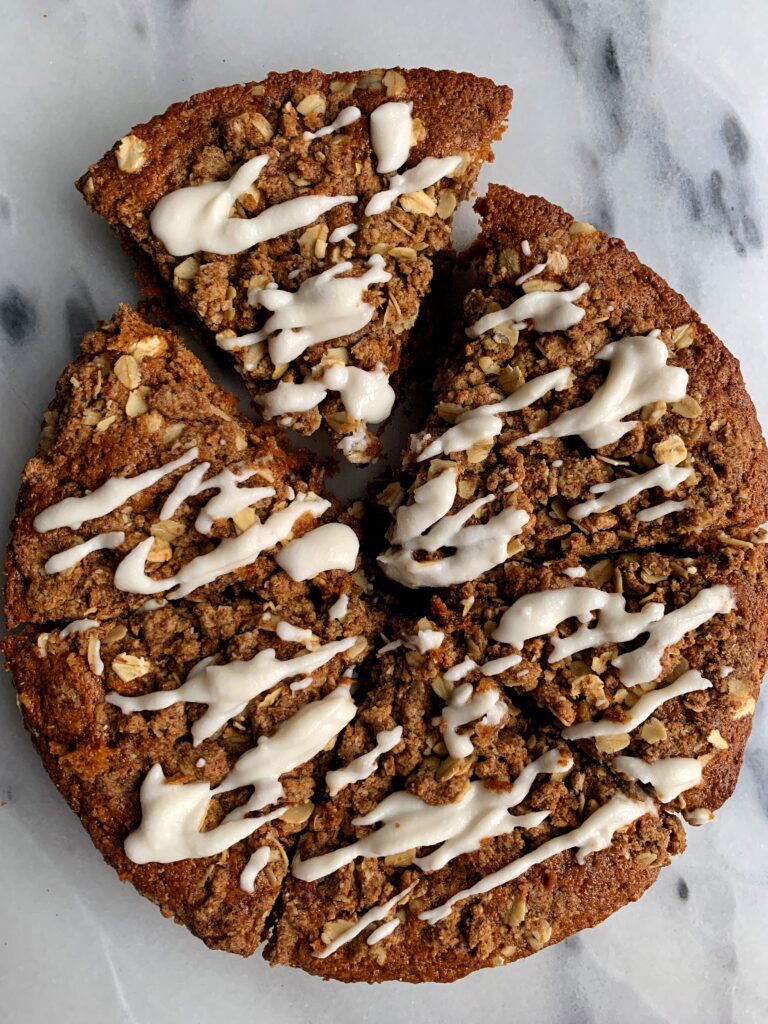 The Best Damn Vegan Carrot Coffee Cake made with all gluten-free ingredients. The most delicious sweet breakfast cake or snack to enjoy with a dreamy crumb cake topping on top of a healthier carrot cake recipe.