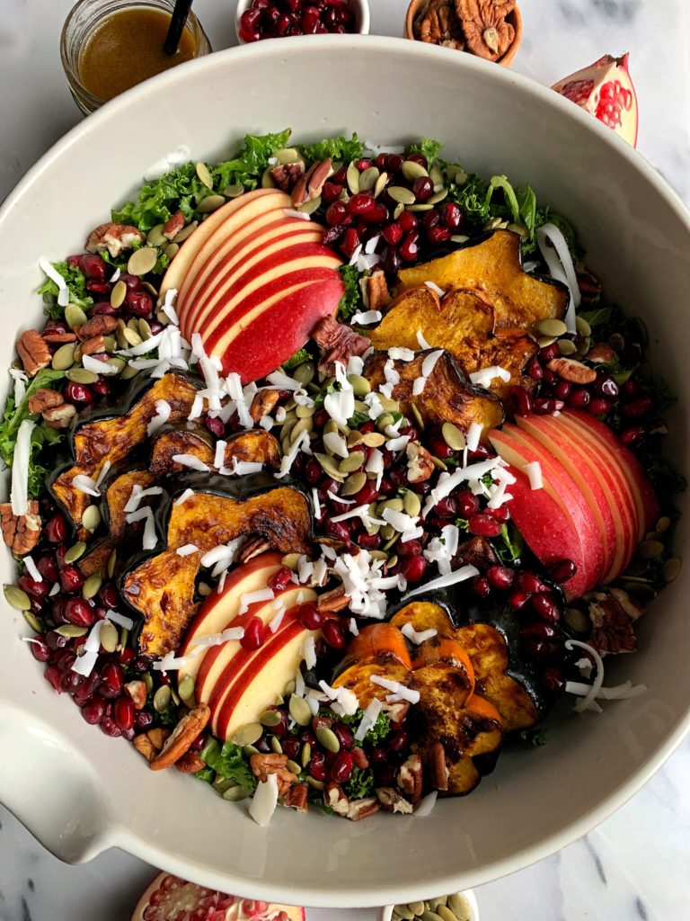 The Ultimate Healthy Harvest Salad made with all gluten-free and vegetarian ingredients. An absolutely delicious wholesome salad filled with roasted squash, fall fruits and a homemade pomegranate honey dressing.