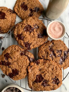 Healthier Bakery-Style Chocolate Chip Cookies made with all gluten-free and vegan ingredients. These taste just like the sea salt chocolate chip cookies from the local bakery and have the best soft gooey center.