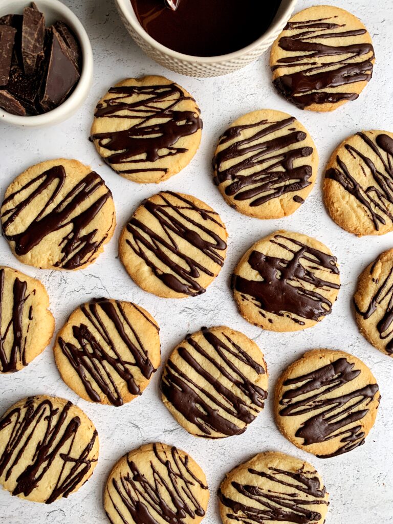 The Easiest Gluten-free Shortbread Cookies made with 3 key ingredients and drizzled with some dark chocolate on top. Such a delicious and simple cookie recipe to make.
