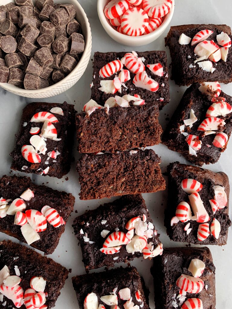The best ever Paleo Peppermint Brownies with a homemade chocolate frosting on top! These are the ultimate holiday brownie recipe and they also happen to be gluten-free, nut-free and hands down better than any boxed brownie mix.