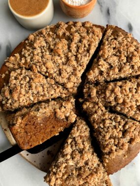 The most delicious Paleo Gingerbread Coffee Cake made with a dreamy gingerbread cake base and topped with a paleo crumb cake topping.