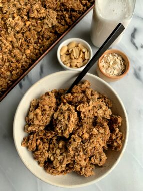 Addicting Gluten-free Cinnamon Peanut Butter Granola with big CLUSTERS! This vegan granola recipe is absolutely delicious and so easy to make.