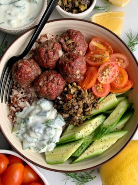 Sharing one of our favorite easy dinners, 30-minute Healthy Greek Meatballs with Tzatziki Sauce! The easiest oven-baked paleo meatballs.