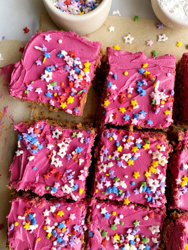 The absolute best Vegan Sugar Cookie Bars made with all gluten-free and nut-free ingredients and topped with vanilla frosting, sprinkles and tastes almost too good to be true for a "healthier" sugar cookie recipe.