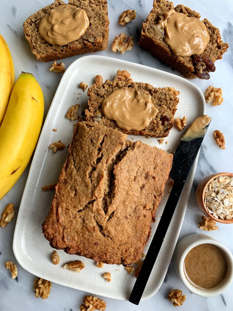 This Vegan Salted Caramel Banana Bread is the ultimate healthy gluten-free banana bread recipe. Filled with homemade salted caramel and some more drizzled on top!