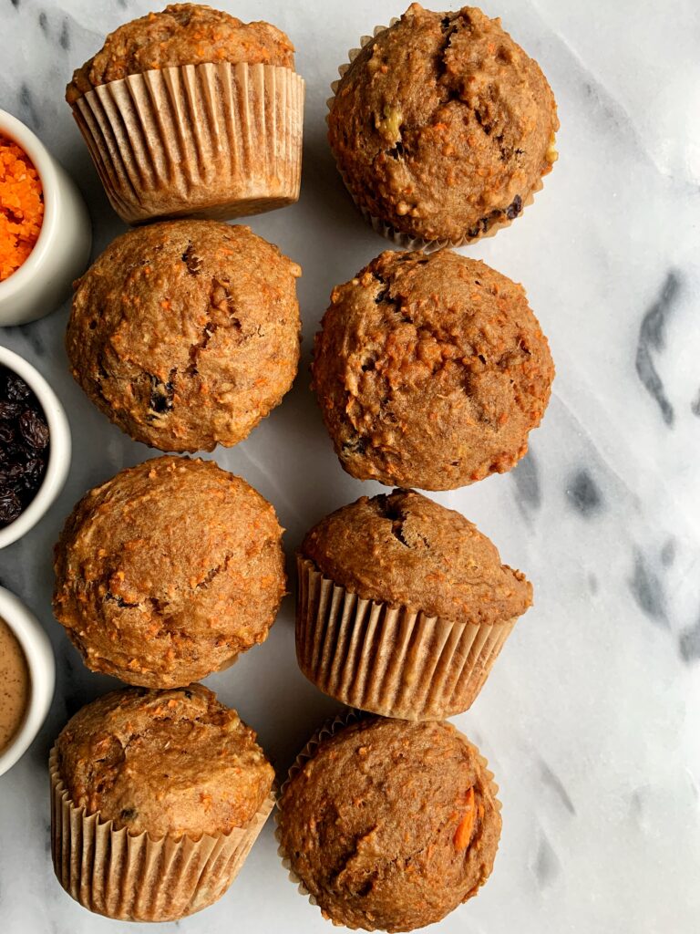 The Best Ever Vegan Morning Glory Muffins made with all gluten-free and dairy-free ingredients. Filled with carrots, raisins, walnuts and have that delicious muffin top and fluffy cakey muffin base.