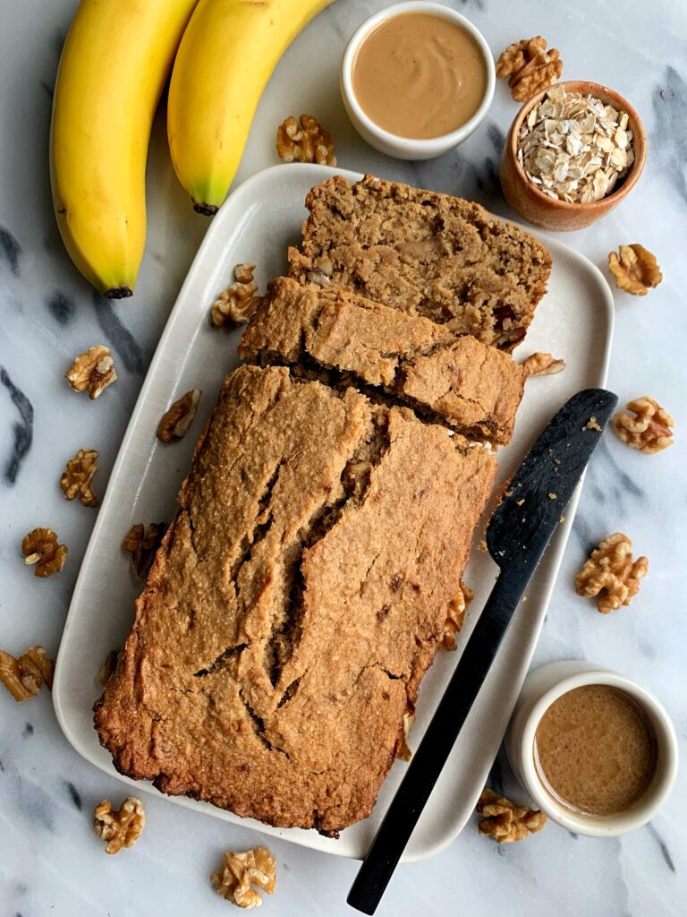 This Vegan Salted Caramel Banana Bread is the ultimate healthy gluten-free banana bread recipe. Filled with homemade salted caramel and some more drizzled on top!
