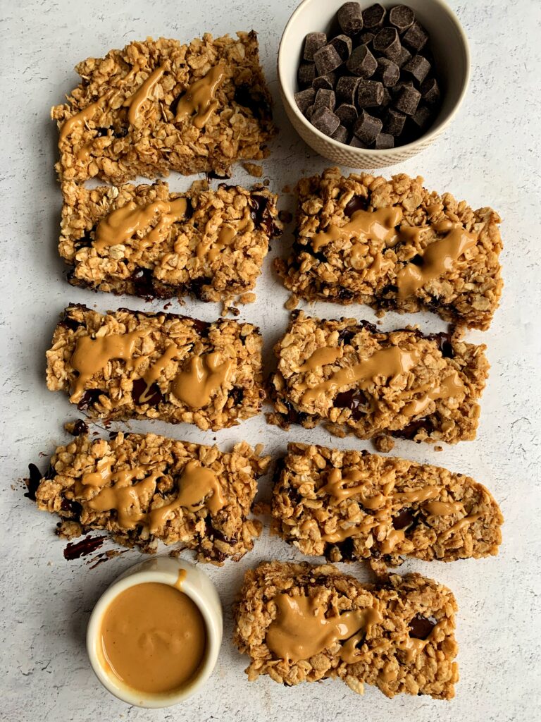 Vegan Chocolate Chip Peanut Butter Granola Bars made just 4 ingredients! These are such an easy gluten-free and homemade chewy granola bar recipe anyone and everyone loves!