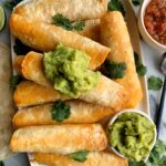 These Gluten-free Buffalo Chicken Taquitos are the ultimate crispy and delicious taquito dish to whip up! Made with all healthy ingredients and ready in just 25 minutes!