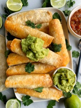 These Gluten-free Buffalo Chicken Taquitos are the ultimate crispy and delicious taquito dish to whip up! Made with all healthy ingredients and ready in just 25 minutes!