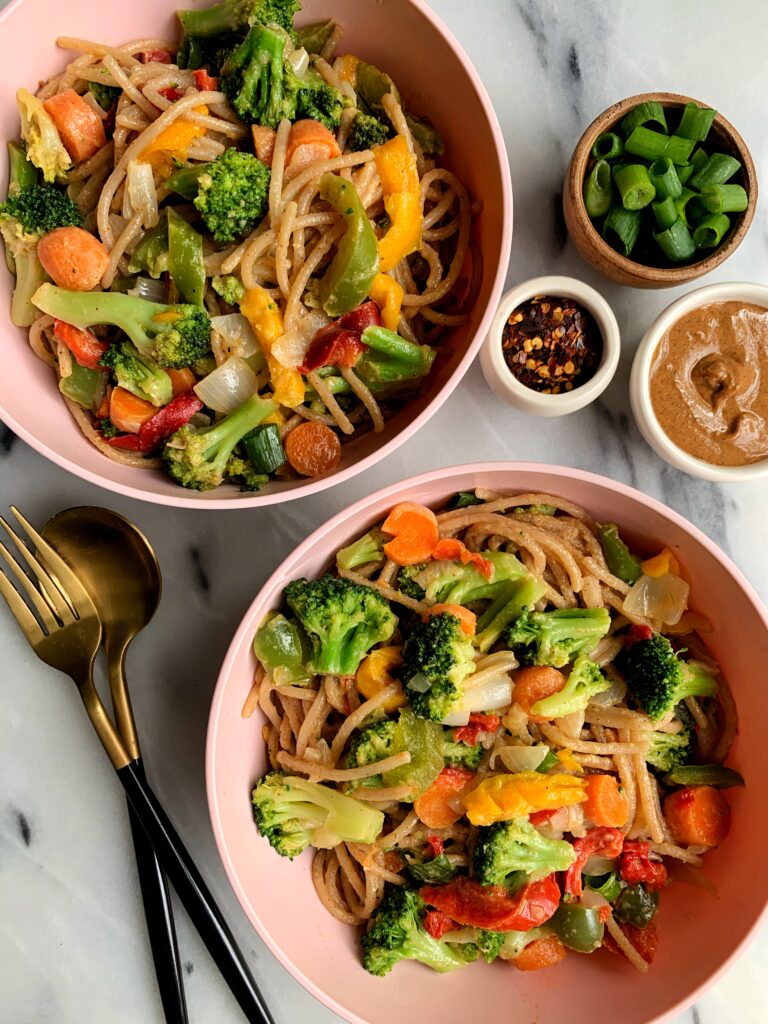 These Vegan Almond Butter Stir Fry Noodles are one of the easiest meals to whip up for a healthy lunch or dinner that takes less then 15 minutes to make! Tossed in a dreamy almond butter sauce.