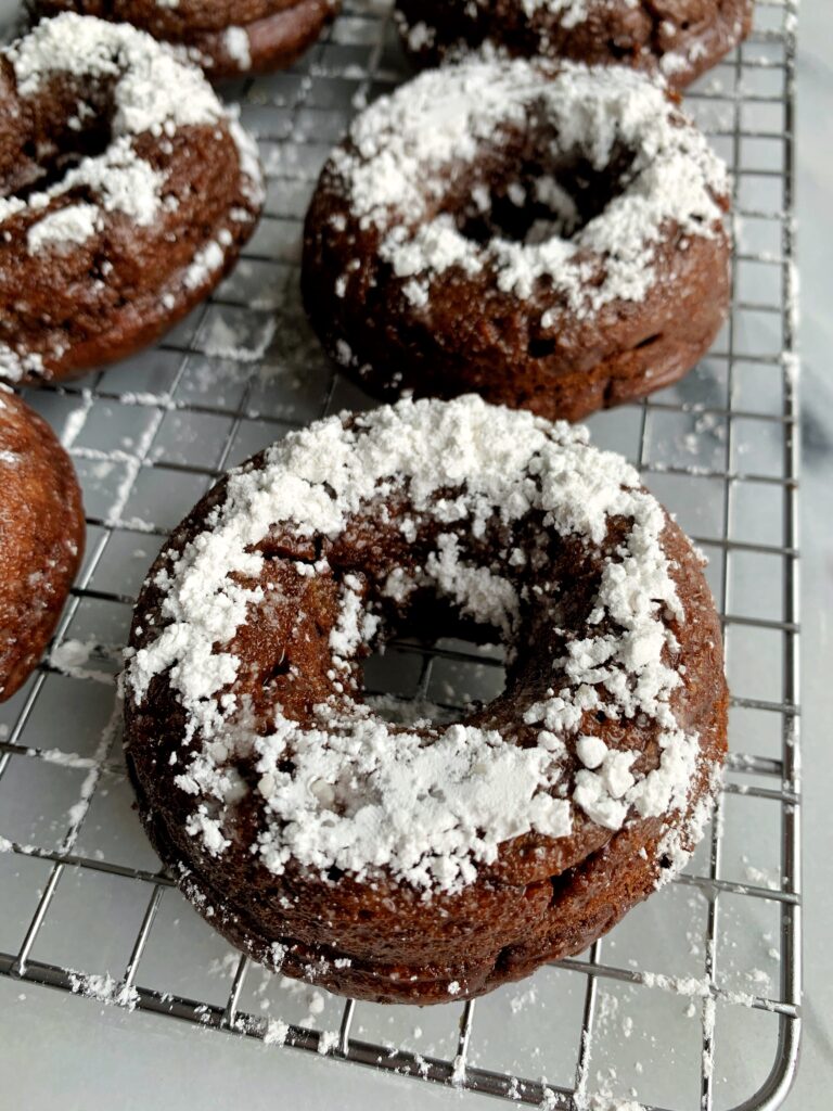 Insanely Good Vegan Chocolate Cake Donuts made with all gluten-free and nut-free ingredients. Plus these oven-baked donuts are ready in less than 15 minutes.