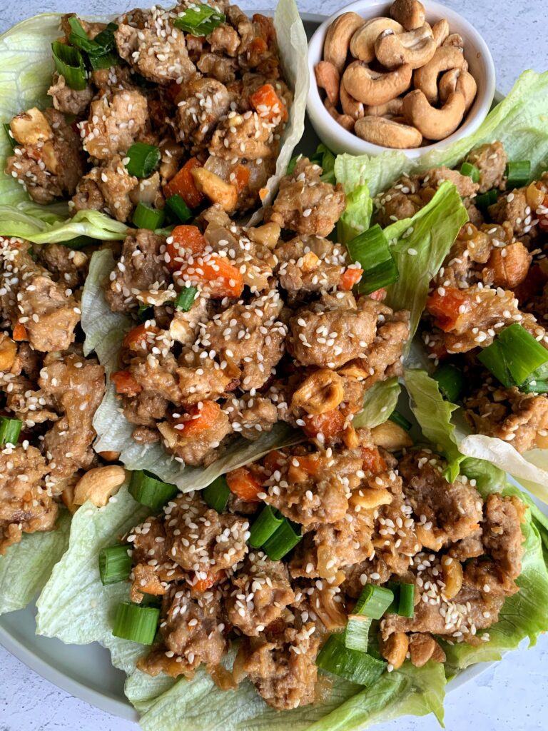 20-Minute Healthy Cashew Chicken Lettuce Cups! A twist on the PF Chang's classic lettuce wraps.