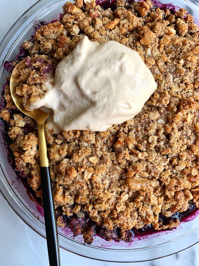 The *Best* Healthy Berry Cobbler Recipe! Made with all gluten-free and vegan ingredients. This cobbler is the ultimate summery dessert paired with your favorite ice cream.