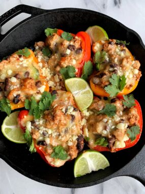 Sharing these easy and healthy Taco Stuffed Peppers! A delicious dinner recipe that is made with all gluten-free and grain-free ingredients. Plus it only takes 20 minutes to whip up for an easy weeknight meal.