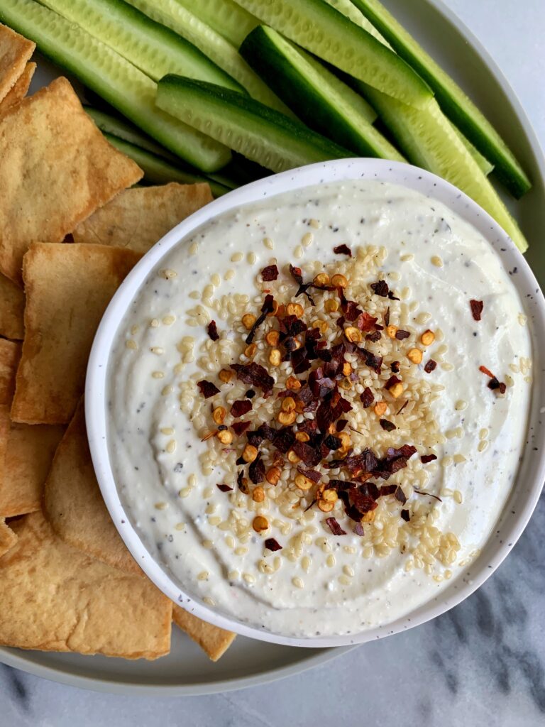 INSANE Creamy Whipped Feta Dip Recipe that is ready in just 5 minutes. Hands down one of the best dips and spreads to make and serve with your favorite chips, veggies, anything!