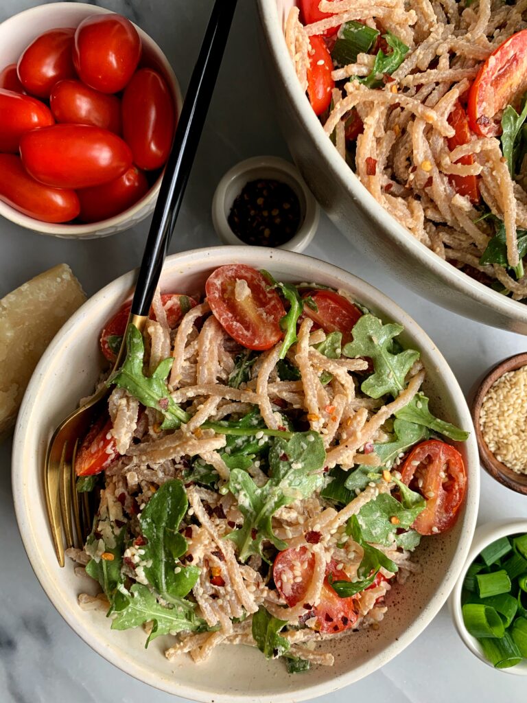 Tahini Parmesan Spaghetti Pasta Salad made with all gluten-free ingredients and the most delicious creamy tahini parmesan dressing. 