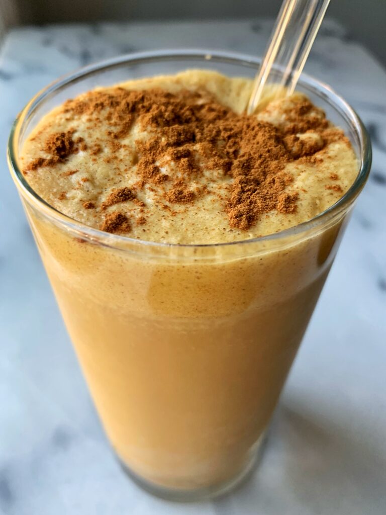 Healthy Iced Pumpkin Spice Latte made with all vegan ingredients. This is a healthier way to make your own pumpkin latte without all the added sugars!