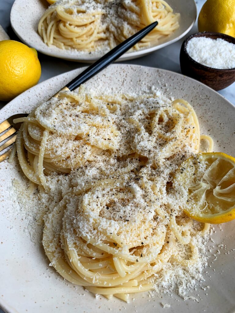 The easiest, quickest and most delicious lemon pasta recipe! Made with just 4 simple ingredients and this meal comes together in under 20 minutes - it is CRAZY good guys!